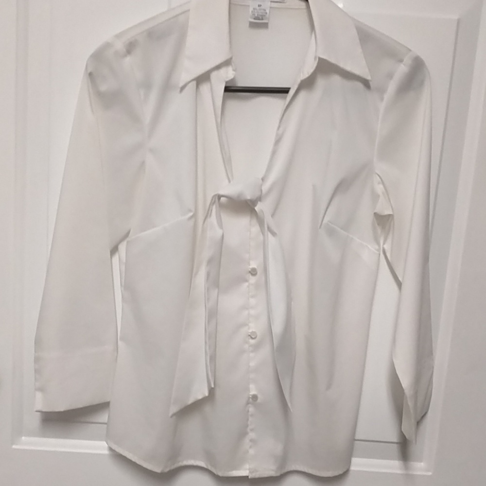 White button down blouse.